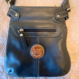 Large cross-body leather Michael Kors bag